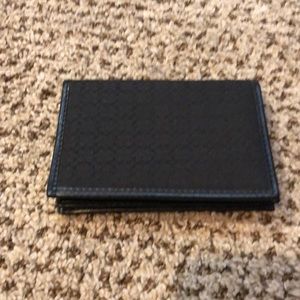 Coach fold over card holder.